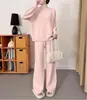 Malhas estilo europeu e americano para outono e inverno: novo conjunto de duas peças para mulheres: suéter grosso de gola semi-alta e calça de perna larga, cor sólida
