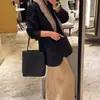 Bolsa de Palha Minimalista para Mulheres 2025 Nova Outono Bolsa de Ombro de Nicho de Luxo Bolsa Tote para o Dia a Dia em Pele de Cabra Importada