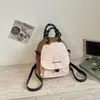 Mochila de bloques de color femenina para mujer 2026 bolso ligero multi-compartimento bolso cruzado para el día a día mochila pequeña bolso ligero tipo concha