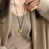 Collar con colgante largo ovalado hueco mate irregular, cadena para la clavícula casual de nicho de alta gama, cadena para suéter, accesorio para el cuello