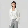 Regata feminina sem mangas, gola baixa, caimento justo, estilo minimalista e casual, colete de gola redonda, primavera 2026, top versátil