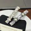 Pinza para el cabello de alta gama con forma de corazón de perla, pinza de pico de pato para flequillo lateral, pinza lateral de figura de ocho con pedrería para mujer