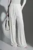 Chaleco de punto suelto adelgazante con cuello alto apilado estilo francés y pantalones rectos de pierna ancha para otoño-invierno, modelo nuevo de nicho 2026