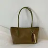 Nueva colección de primavera 2026: Bolso de mano para mujer estilo coreano, con un elegante diseño color block, gran capacidad y correa para el hombro, lo que lo convierte en un bolso tote versátil para ventas transfronterizas.