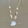 Colar de Pérolas com Concha de Estrela do Mar Fresca para Mulheres Estilo Férias na Praia Corrente de Clavícula Único Novo Estilo 2026 Acessórios Atmosféricos