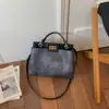Bolso de Mano Simple de Gran Capacidad para Mujer 2026 Nuevo Moda Europea y Americana Bolso de Hombro Texturizado para el Trabajo y los Viajes Diarios Bolso Cruzado