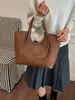 Bolso Tote de Textura Tejida de Alto Valor Gran Capacidad para Viajar al Trabajo Bolso de Hombro Único Nuevo Estilo 2026 Yuezi Chao Bolso de Mano Simple