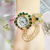 TikTok Nuevo Estilo Coreano para Mujer Reloj de Cuarzo Elegante con Diamantes Moda Pulsera de Aleación Reloj para Mujer en stock Mayoreo