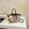 Bolso Cruzado de Hombro de Moda Coreana Transfronterizo de Gama Alta Bolso de Mano de Lujo Ligero de Temperamento Simple Bolso Cubo Elegante de Color Sólido