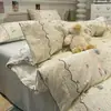 Juego de cama de cuatro piezas con ribete de encaje, sábana de algodón lavado amigable con la piel, funda de edredón, sábana bajera ajustable, cubrecama de tres piezas para dormitorio de estudiante