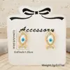 Venta caliente transfronteriza pendientes pequeños y exquisitos de ojo de diablo personalidad retro francesa nicho creativo pendientes de hip-hop joyería