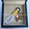 Dinero en el Caballo Cuero de Vaca Creativo Exquisito Casual Regalo de Pareja Bolso Lindo Colgante Llavero de Coche Llavero