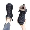 Botas de nieve populares para mujer 2026 nuevo estilo de suela plana, forradas de felpa, engrosadas, zapatos de algodón del noreste, impermeables, antideslizantes, botas cortas cálidas