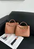 Cuero Genuino Gran Capacidad Hebilla de Cuerda Metálica Bolso Tejido de Vacuno Nuevo Estilo Comercio Exterior Bolso de Mano con Lazo Grande Bolso de Hombro para Mujer