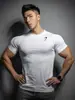Gymshark Fitness Manga Corta para Hombre Mallas Deportivas Musculares Camiseta Elástica Estampado de Tiburón Secado Rápido Top Moderno