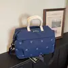 Bolsa de viagem portátil feminina para viagens curtas 2026 nova tendência moda ao ar livre bolsa de bagagem de armazenamento grande capacidade transversal bolsa de academia