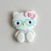 Nuevos Accesorios de Gato Kt con Gafas y Postura Sentada Pasador DIY Adorno para el Cabello Funda para Teléfono Celular Zuecos con Decoración de Pegamento de Crema