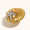 Joia Criativa Estilo Férias Oceânicas Transfronteiriças Europeia e Americana Anel Casual de Aço Inoxidável Banhado a Ouro 18K Estrela do Mar Concha para Mulheres