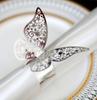 Comercio exterior nuevo servilletero reflectante oro rosa flor hueca anillo para servilleta suministros decorativos juego de anillos de papel venta al por mayor directa