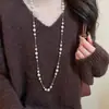 Nuevo collar de perlas artificiales de doble capa, cadena para la clavícula de moda exquisita transfronteriza, cadena de suéter de lujo ligero estilo francés
