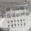 Accesorios de arte para uñas de cruz oscura de 12 piezas, artículo popular de exportación transfronteriza, remaches de aleación y pedrería, accesorios de uñas portátiles para DIY