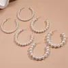 Brincos Redondos Geométricos com Pérolas Artificiais Europeus e Americanos, com um Toque Elegante e Sofisticado, Design Único e Minimalista