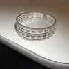 Pulsera Abierta Multicapa de Perlas Incrustadas con Diamantes 2025 Nueva Pulsera Transfronteriza Europea y Americana de Lujo Ligero de Alta Gama de Nicho para Mujer
