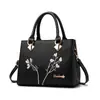 Bolsa feminina de couro PU recomendada para comércio exterior 2021 nova bolsa feminina bolsa de mão grande capacidade ombro único transversal primeira geração