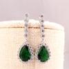 Pendientes Qingxing de cobre con incrustaciones de gota de agua y circonita de cristal. Pendientes Chaozhou europeos y americanos. Suministro transfronterizo. Accesorios directos de fábrica.