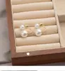 Coreia do Sul personalidade da moda frente e verso dois usos brincos de pérola branco pérola brincos de temperamento brincos de design único novos