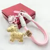 Llavero de Hazte Rico Inmediatamente Zodiaco de Dibujos Animados Llave de Coche Colgante de Pony Dorado Versátil para Pareja Adorno Lindo