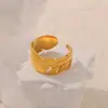 Anillo de 18K para Mujer Diseño de Nicho Ins Anillo de Unión Geométrica Anillo de Acero de Titanio Anillo de Línea de Hoja Hueca Joyería