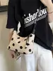 Bolso de hombro de lunares de moda transfronterizo, elegante bolso de axila de nicho de gran capacidad, elegante bolso cruzado con diseño de lunares