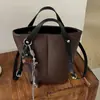Bolsa feminina com padrão lichia 2026 nova outono alta qualidade vintage para o dia a dia bolsa de mão bolsa de ombro transversal bolsa saco