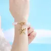 Estilo Playa Verano Corazón Diseño Retro Francés Perla Chapado en Oro Hebilla OT Acero Inoxidable Concha Estrella de Mar Colgante Pulsera