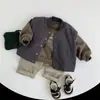Colete de algodão reversível, novo estilo inverno 2026, design xadrez para meninos e meninas, adequado para bebês e crianças pequenas, colete quente e estiloso estilo coreano
