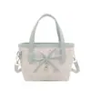 Bolso de mano estampado de nicho súper popular para mujer, nuevo modelo 2026, mini bolso cruzado versátil, bolso tote pequeño para salir