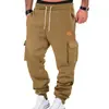Desejo comércio exterior primavera e outono esportivo versátil bolso etiqueta de couro roupa de trabalho cordão calça jogger masculina vestuário atacado