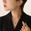 Conjunto de Colar e Brincos de Aço Inoxidável Banhado a Ouro com Pedra Olho de Gato Turquesa Europeu e Americano Transfronteiriço, Moderno e Versátil