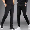 Pantalones casuales gruesos para hombre de primavera y otoño, joggers deportivos holgados de cintura alta de corte slim versátiles con cremallera y perneras rectas