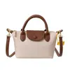 Bolsa Quadrada Pequena Nova Outono e Inverno Transfronteiriça Bolsa de Ombro Único Transversal Nicho Retrô Bolsa de Mão Fashion de Alta Qualidade para Mulheres