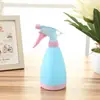 Regadera manual de prensa portátil al por mayor para plantas de balcón en casa, rociador para regar flores, regadera de caramelo, herramienta de riego para jardín