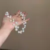 Elegante y estilizado collar de perlas estrelladas para mujer, nueva colección 2026, una cadena de clavícula popular y de alta gama, un collar ligero y versátil