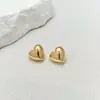 Nuevos Pendientes de Botón Versátiles de Estilo Básico Dulces Metálicos Brillantes con Forma de Corazón Pendientes al por Mayor Transfronterizos Europeos y Americanos para Mujer