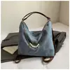 Bolsa de Ombro Francesa com Laço Transfronteiriça Feminina Nova Sensação de Design Mochila de Nicho Bolsa Tote Retrô de Grande Capacidade
