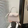Bolso Kelly Pequeño Nuevo 2026 Color Sólido Repujado, Bolso de Mano Simple y Texturizado, Bolso Cruzado para Mujer, Bolso de Estilo Lujo Ligero para el Uso Diario