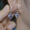 Exquisitos aretes versátiles de bola de circonita púrpura 2024 nuevo diseño aretes de moda simple estilo extranjero