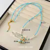 Nuevo Collar de Calabaza de Trébol de Cuatro Hojas Esmaltado Azul de Moda y Exquisito Estilo Chino, Joyería de Lujo Ligero de Nicho de Gama Alta para Mujeres