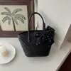 Bolsa Pequena Super Quente para o Dia a Dia Feminina 2026 Nova de Verão Textura Trançada de Alto Padrão Bolsa de Ombro Único Transversal Estilo Balde