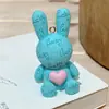 Llavero de letras de dibujos animados conejo de la suerte para mujer lindo creativo exquisito llavero de coche colgante de bolso al por mayor